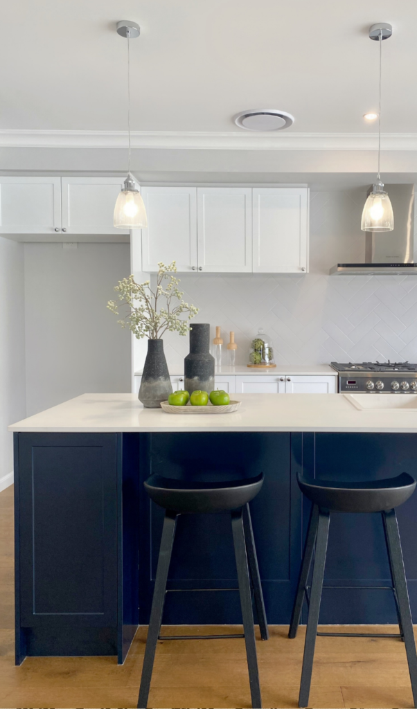 beautiful navy kitchen counter with minimal number of decorations