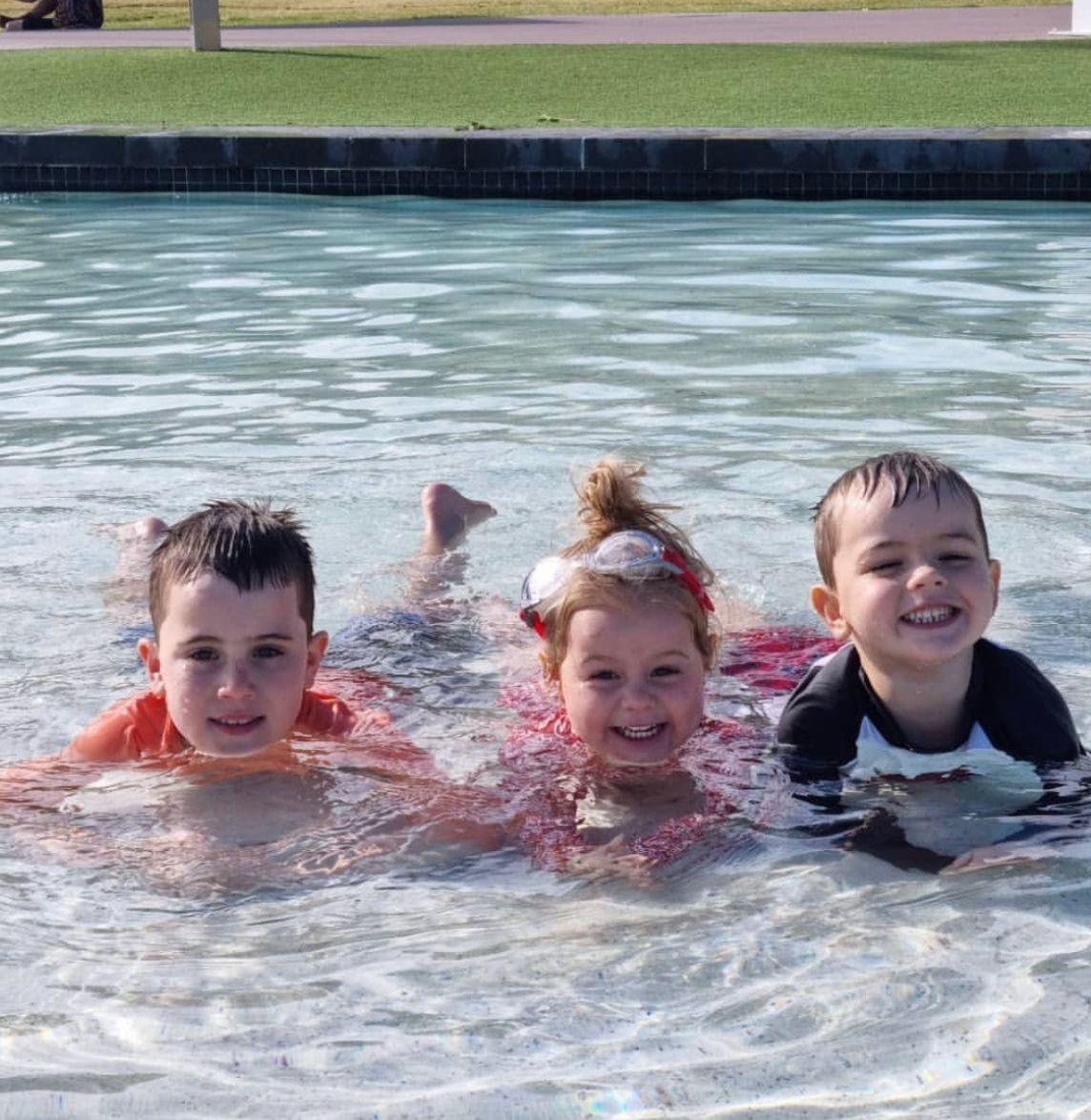 Family life as a business, Jake and Phoebe's three oldest children enjoying the pool on holidays.