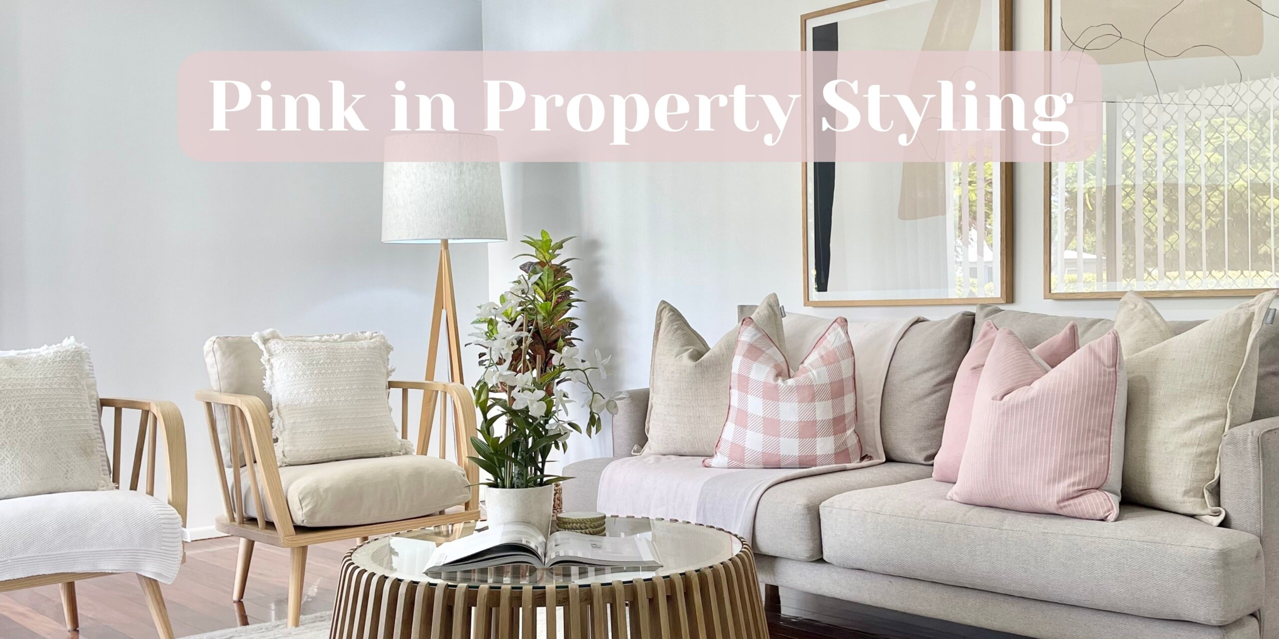 Pink property styling, pink in home staging - a white and cream living room with pink accents